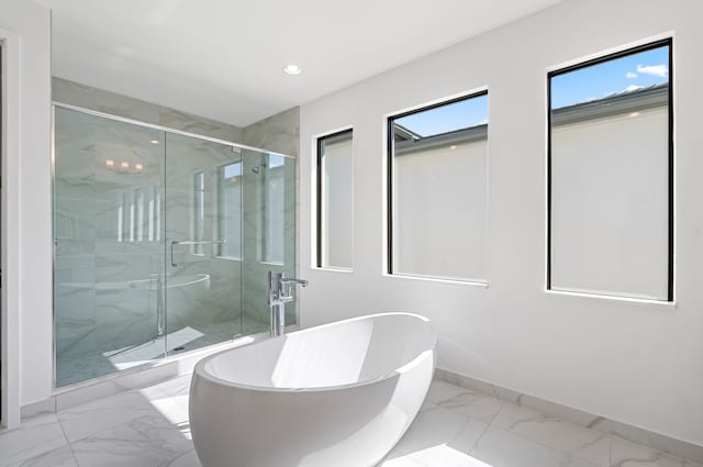 8342 Crystal Downs Ave, Boca Raton, FL 33434 - bathroom featuring marble look tile flooring, a soaking tub, a marble finish shower, baseboards, and recessed lighting