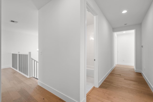 8342 Crystal Downs Ave, Boca Raton, FL 33434 - corridor featuring light wood finished floors, baseboards, and recessed lighting