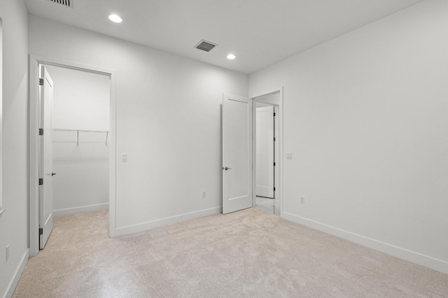 8342 Crystal Downs Ave, Boca Raton, FL 33434 - unfurnished bedroom featuring light colored carpet, baseboards, a spacious closet, recessed lighting, and a closet