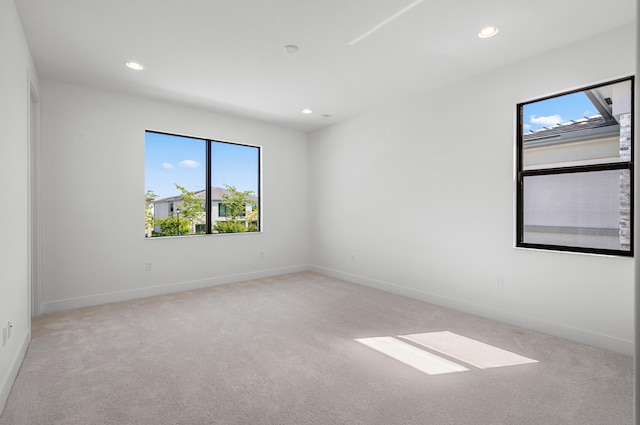 8342 Crystal Downs Ave, Boca Raton, FL 33434 - carpeted empty room with plenty of natural light, recessed lighting, and baseboards