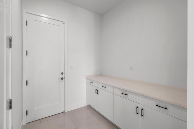 8342 Crystal Downs Ave, Boca Raton, FL 33434 - doorway to outside featuring baseboards