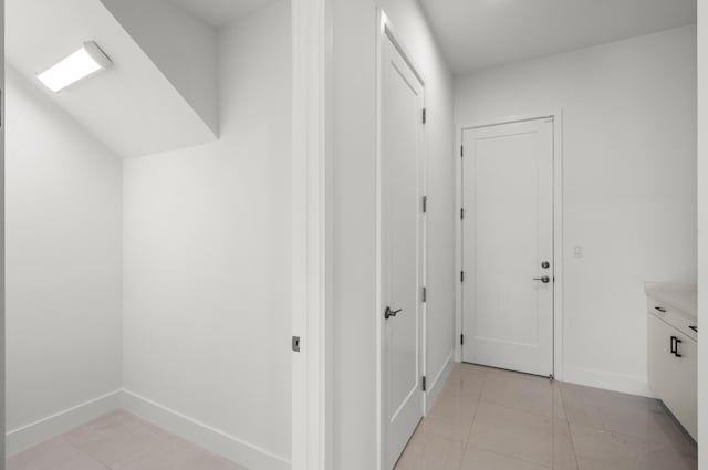 8342 Crystal Downs Ave, Boca Raton, FL 33434 - hall featuring light tile patterned floors and baseboards