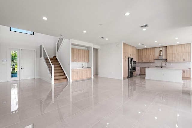 8342 Crystal Downs Ave, Boca Raton, FL 33434 - unfurnished living room featuring a sink, recessed lighting, light tile patterned floors, and baseboards