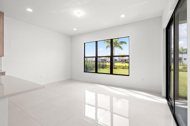 8342 Crystal Downs Ave, Boca Raton, FL 33434 - unfurnished room with light tile patterned floors, recessed lighting, and baseboards
