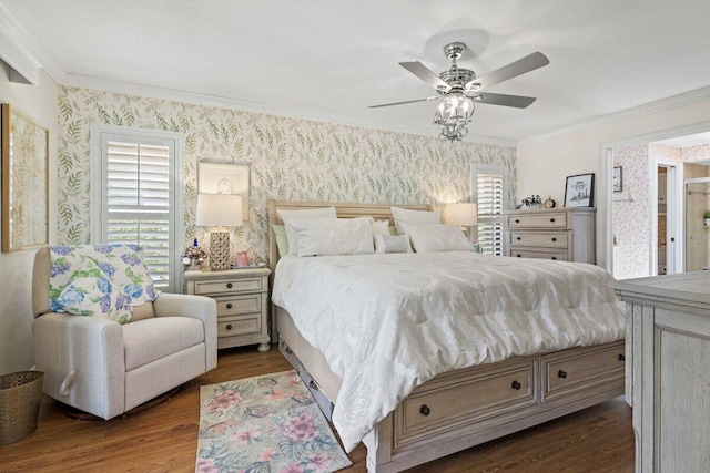 1345 SW Cedar Cv E, Port Saint Lucie, FL 34986 - bedroom featuring wallpapered walls, dark wood-style flooring, ornamental molding, and a ceiling fan