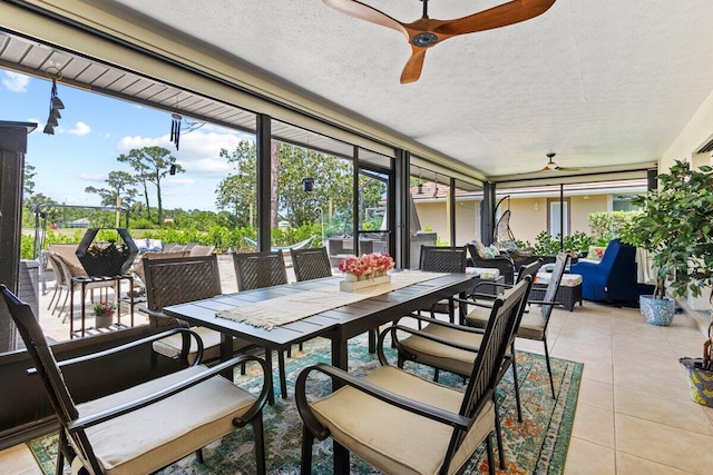 1345 SW Cedar Cv E, Port Saint Lucie, FL 34986 - sunroom / solarium featuring a ceiling fan, outdoor dining space, and healthy amount of natural light