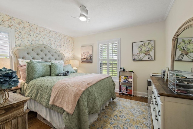 1345 SW Cedar Cv E, Port Saint Lucie, FL 34986 - bedroom featuring ornamental molding, wood finished floors, and baseboards