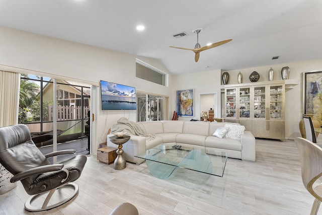 12092 Aprilia Dr, Boynton Beach, FL 33437 - living area featuring vaulted ceiling, ceiling fan, light wood-style flooring, and recessed lighting