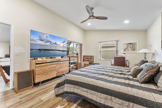 12092 Aprilia Dr, Boynton Beach, FL 33437 - bedroom featuring wood finished floors, recessed lighting, ceiling fan, and vaulted ceiling