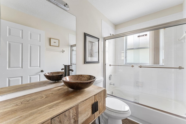 12092 Aprilia Dr, Boynton Beach, FL 33437 - full bathroom featuring toilet, combined bath / shower with glass door, and vanity