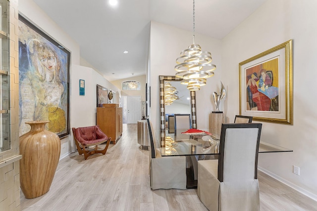 12092 Aprilia Dr, Boynton Beach, FL 33437 - dining room with light wood-type flooring, a chandelier, baseboards, vaulted ceiling, and recessed lighting
