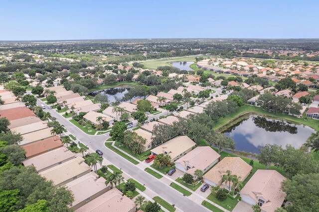 12092 Aprilia Dr, Boynton Beach, FL 33437 - aerial view of property and surrounding area with a large body of water and nearby suburban area
