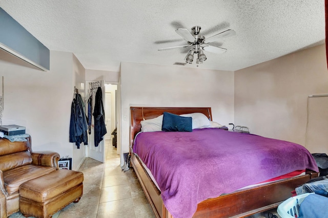 4296 Woodstock Dr Unit A, West Palm Beach, FL 33409 - bedroom with a textured ceiling and a ceiling fan
