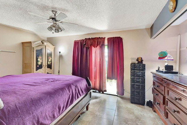 4296 Woodstock Dr Unit A, West Palm Beach, FL 33409 - bedroom featuring a textured ceiling, ceiling fan, and access to outside