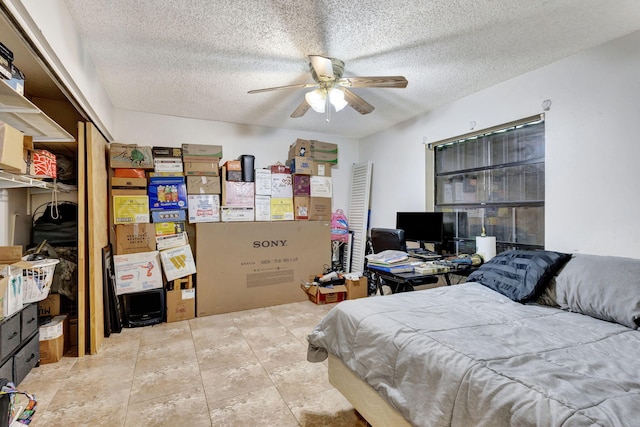 4296 Woodstock Dr Unit A, West Palm Beach, FL 33409 - bedroom featuring a closet, a textured ceiling, and ceiling fan