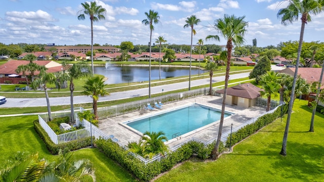 4296 Woodstock Dr Unit A, West Palm Beach, FL 33409 - community pool featuring a water view, a residential view, and a patio