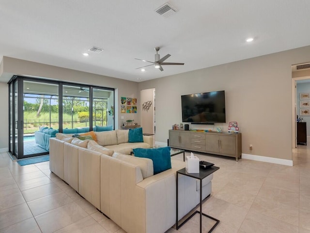 5082 Monroe Cir, Vero Beach, FL 32967 - living room with a ceiling fan, baseboards, and recessed lighting
