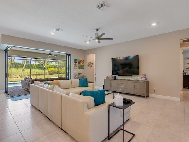 5082 Monroe Cir, Vero Beach, FL 32967 - living room with ceiling fan, baseboards, recessed lighting, and light tile patterned flooring