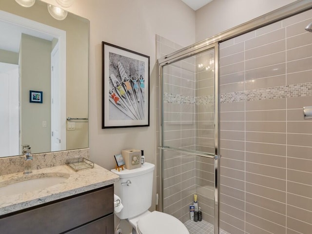 5082 Monroe Cir, Vero Beach, FL 32967 - bathroom with a stall shower, toilet, and vanity