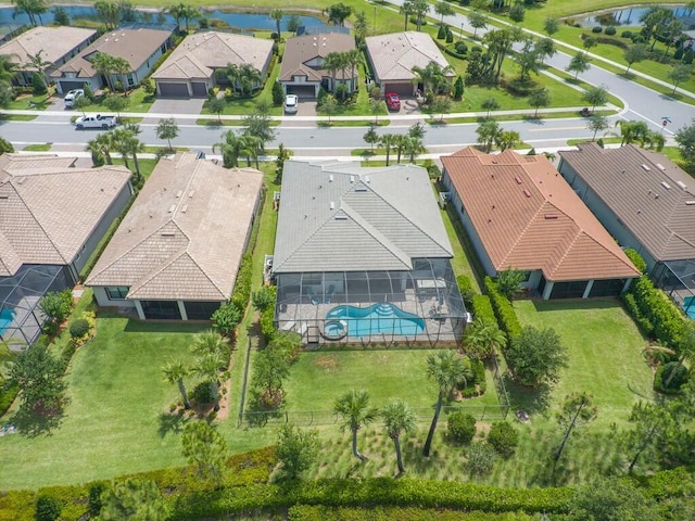 5082 Monroe Cir, Vero Beach, FL 32967 - aerial perspective of suburban area with a nearby body of water and a pool area