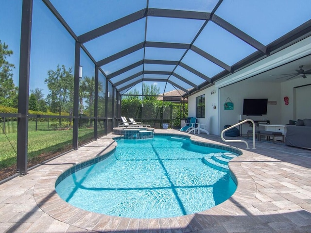 5082 Monroe Cir, Vero Beach, FL 32967 - view of pool featuring a patio, a pool with connected hot tub, ceiling fan, a lawn, and a lanai
