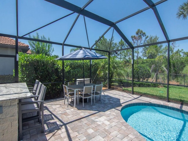 5082 Monroe Cir, Vero Beach, FL 32967 - view of swimming pool with a patio, glass enclosure, and outdoor dining area