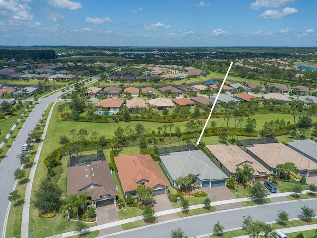 5082 Monroe Cir, Vero Beach, FL 32967 - aerial view of property's location with nearby suburban area and a nearby body of water