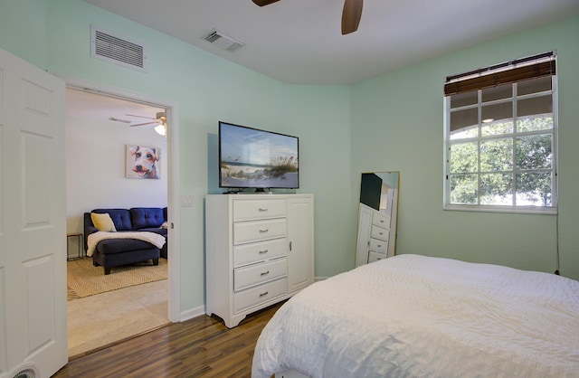 1406 W Wickham Cir Unit A, Delray Beach, FL 33445 - bedroom featuring dark wood-style flooring and a ceiling fan
