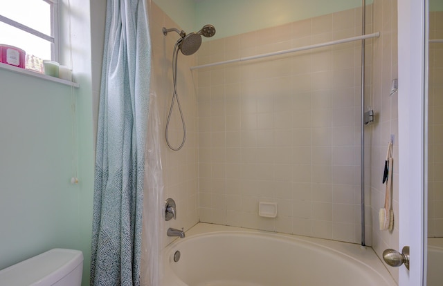 1406 W Wickham Cir Unit A, Delray Beach, FL 33445 - bathroom featuring shower / bath combination with curtain and toilet