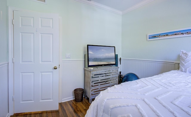 1406 W Wickham Cir Unit A, Delray Beach, FL 33445 - bedroom with wainscoting, ornamental molding, and dark wood-style flooring