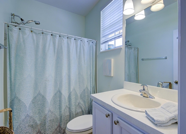 1406 W Wickham Cir Unit A, Delray Beach, FL 33445 - bathroom with vanity, toilet, and a shower with shower curtain