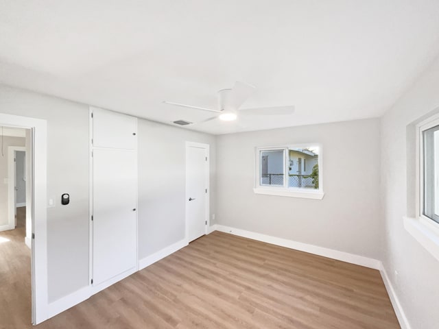 417 Philadelphia Dr, Jupiter, FL 33458 - unfurnished bedroom featuring light wood-style flooring, baseboards, and a closet
