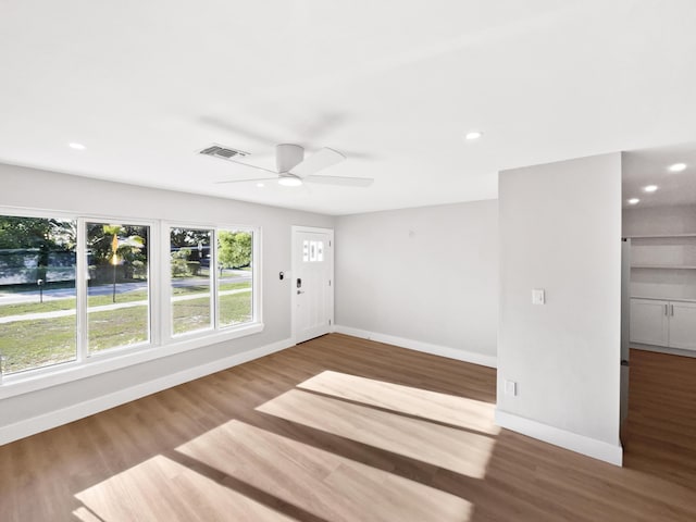 417 Philadelphia Dr, Jupiter, FL 33458 - foyer featuring baseboards, wood finished floors, and recessed lighting