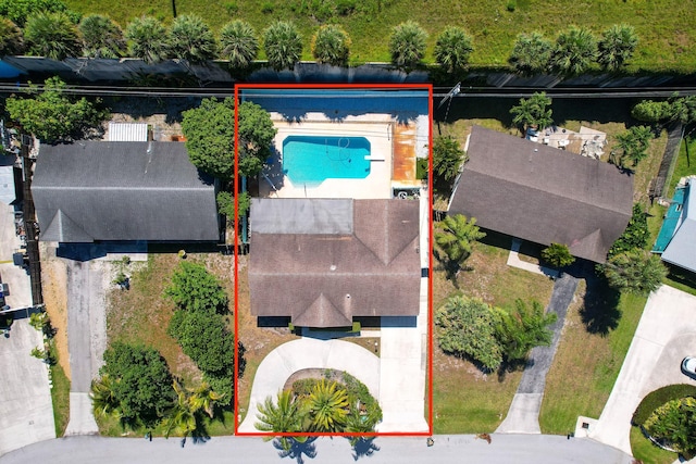 view of property location with a pool area and property parcel outlined
