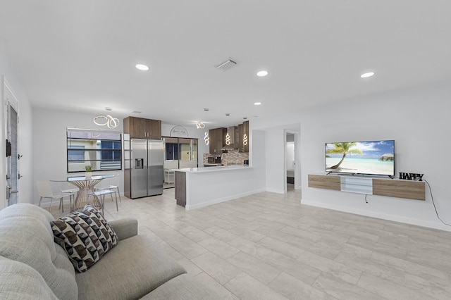 234 Capri E, Delray Beach, FL 33484 - living room featuring recessed lighting and baseboards