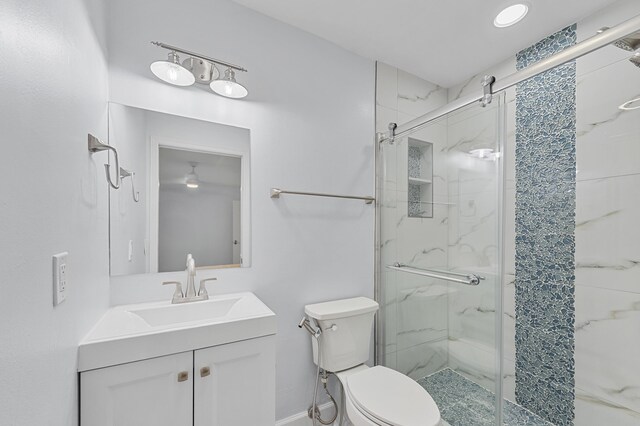 234 Capri E, Delray Beach, FL 33484 - bathroom featuring a marble finish shower, toilet, and vanity