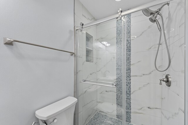 234 Capri E, Delray Beach, FL 33484 - full bathroom featuring a marble finish shower and toilet