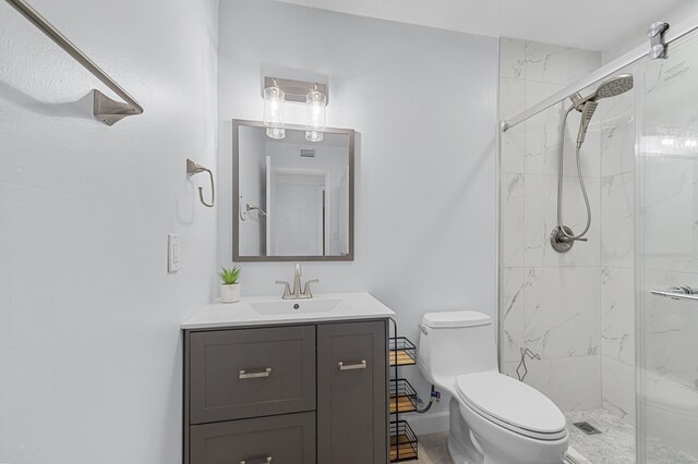 234 Capri E, Delray Beach, FL 33484 - bathroom featuring a marble finish shower, toilet, and vanity