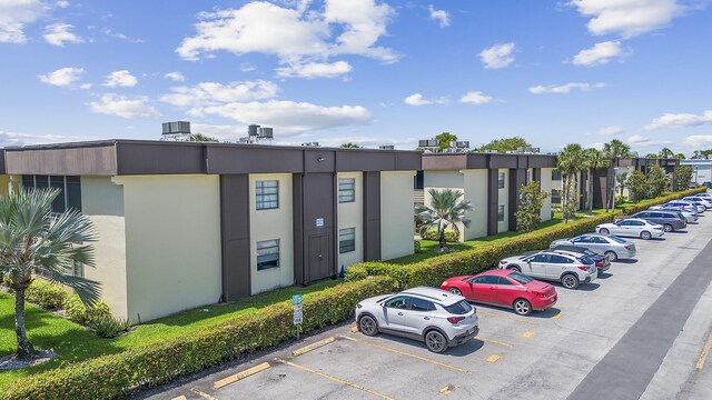 234 Capri E, Delray Beach, FL 33484 - view of property featuring uncovered parking