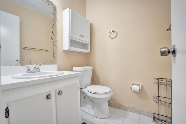 3647 SW Natura Ave Unit B, Deerfield Beach, FL 33441 - half bathroom featuring toilet, vanity, and tile patterned flooring
