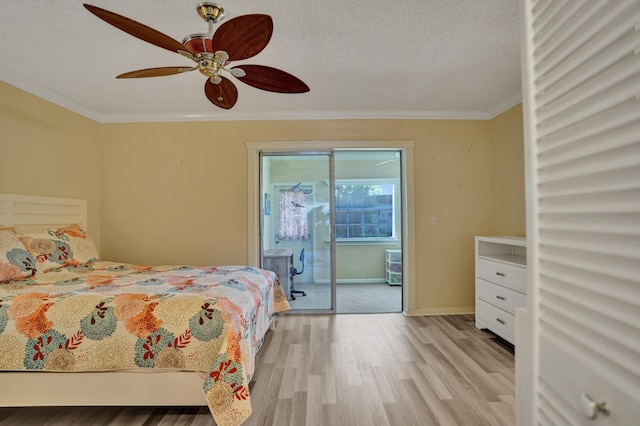 3647 SW Natura Ave Unit B, Deerfield Beach, FL 33441 - bedroom with light wood-style flooring, ornamental molding, baseboards, and a ceiling fan