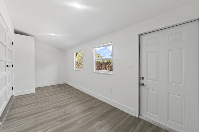 2232 SW 14th Ct, Fort Lauderdale, FL 33312 - interior space with baseboards, lofted ceiling, and wood finished floors