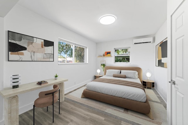 2232 SW 14th Ct, Fort Lauderdale, FL 33312 - bedroom featuring a wall mounted air conditioner, an office area, wood finished floors, and baseboards