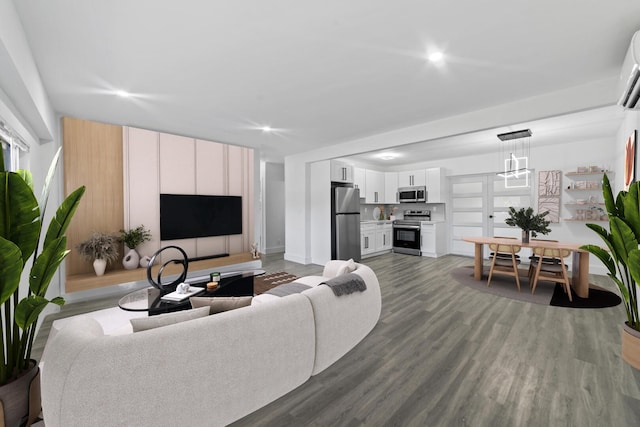 2232 SW 14th Ct, Fort Lauderdale, FL 33312 - living area with dark wood-type flooring, recessed lighting, baseboards, and a wall mounted air conditioner