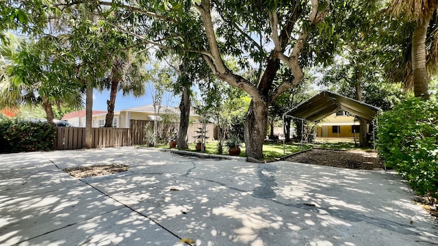 1120 S Federal Hwy, Lake Worth, FL 33460 - view of front of home featuring fence and a carport