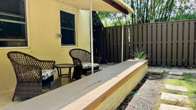 1120 S Federal Hwy, Lake Worth, FL 33460 - view of patio / terrace with fence and an outdoor living space