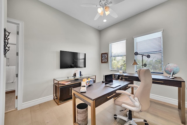 office space with light wood finished floors, ceiling fan, baseboards, and recessed lighting