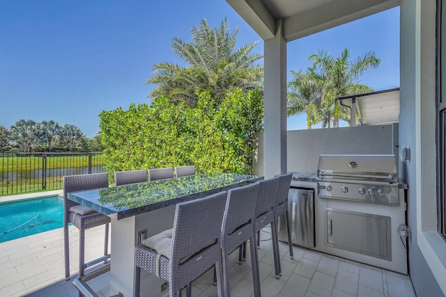 view of patio featuring a water view