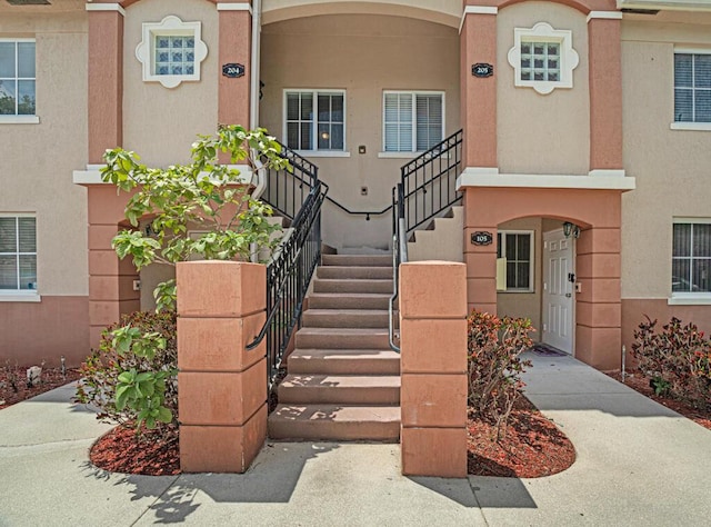 3810 N Jog Rd Unit 204, West Palm Beach, FL 33411 - view of exterior entry with stucco siding