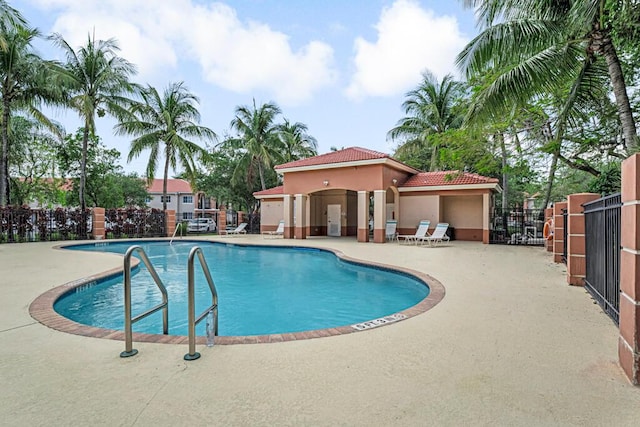 3810 N Jog Rd Unit 204, West Palm Beach, FL 33411 - community pool with a patio